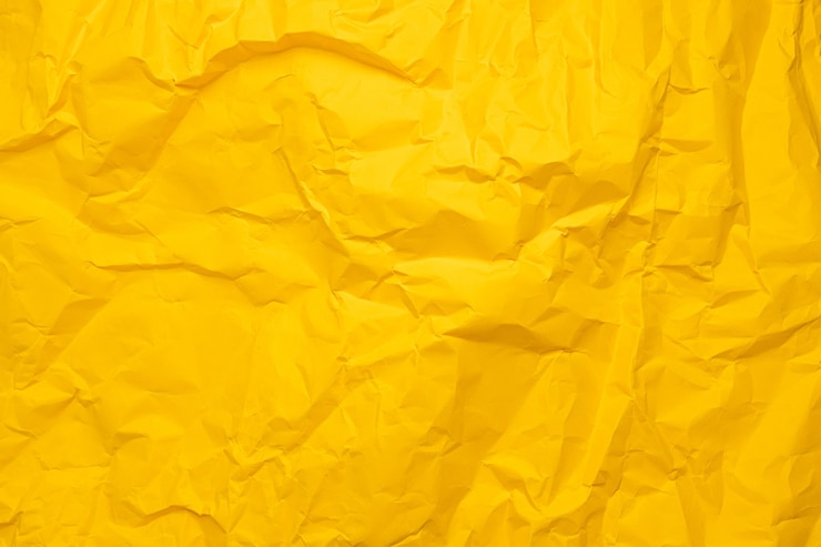 Photo yellow paper texture background crumpled paper abstract shape background with space paper for text