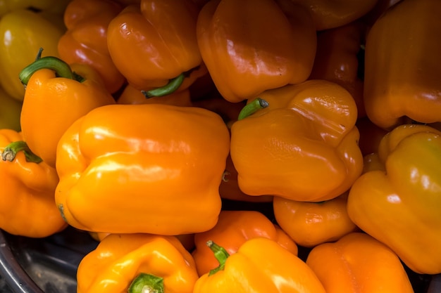 Yellow paprika pepper on the counter of the store