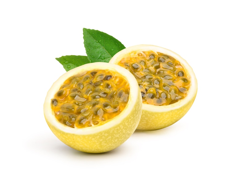 Photo yellow passion fruit cut in half  isolated on white surface