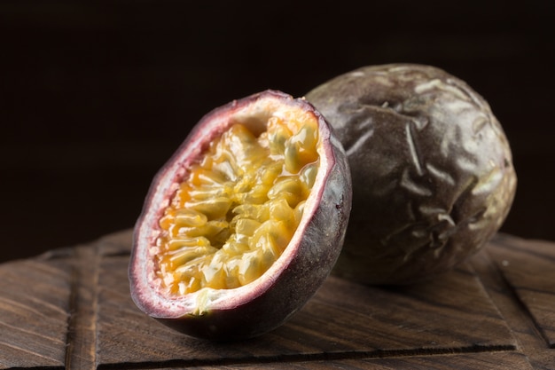 Yellow passion fruit on wood 