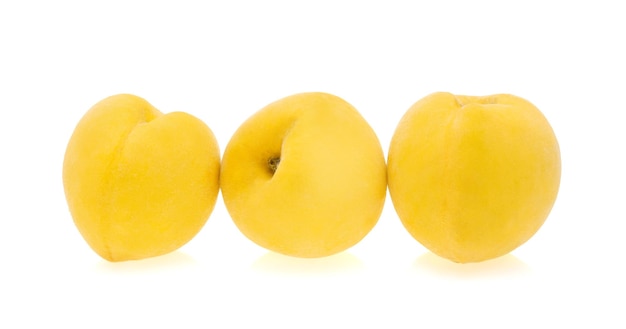 Yellow peach isolated on the white background