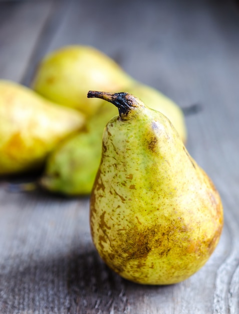 Yellow pears in a row