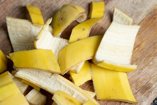 The yellow peel that was left after the bananas on the board