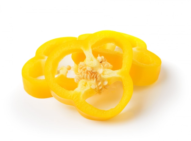 Yellow pepper slices on white space