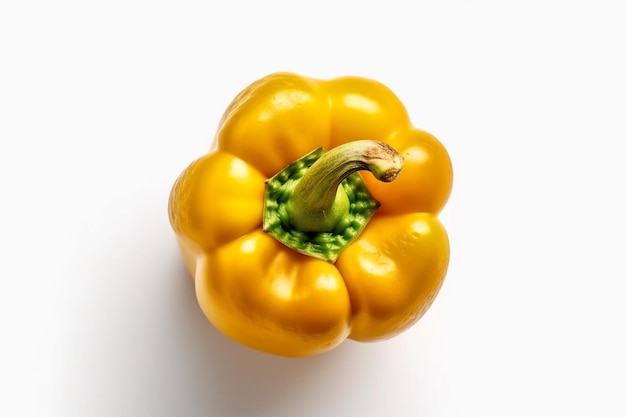 A yellow pepper with a green stem is on a white background.