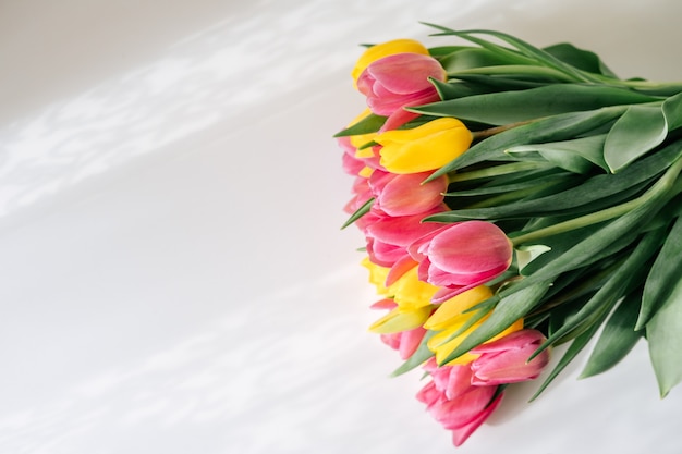 Yellow and pink tulips bouquet