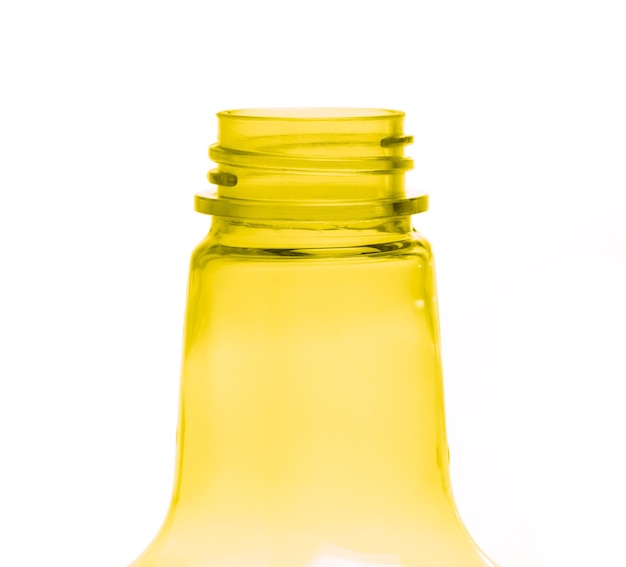 Photo yellow plastic bottle isolated on white background