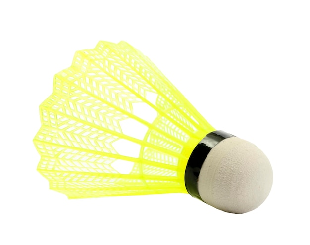 Yellow plastic shuttlecock isolated on white