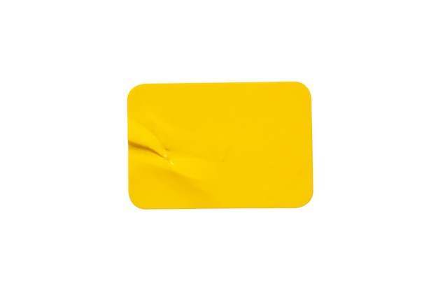 Photo yellow plastic sticker label isolated on white background