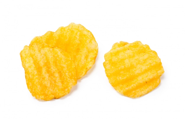 Yellow potato chips isolated on white