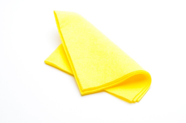 Yellow rag for wiping on isolated white