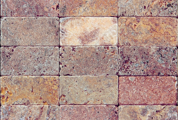 Yellow and red travertine and marble tiles Used in architecture and interior design. Also a good background.