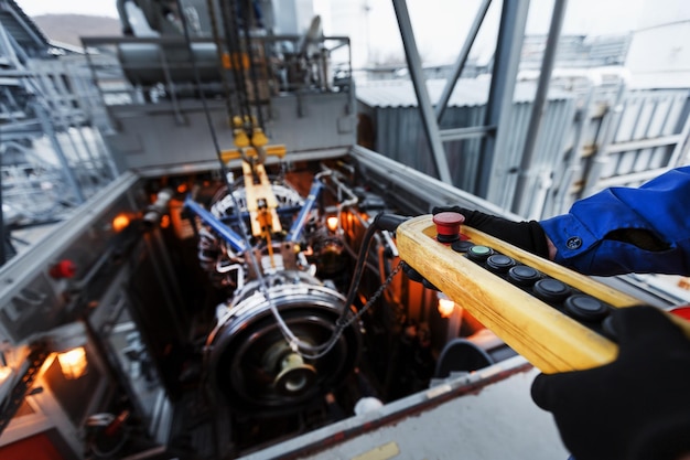 Yellow remote control of a crane for installing a