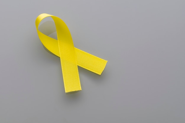 Yellow ribbon of the suicide prevention campaign. Yellow September