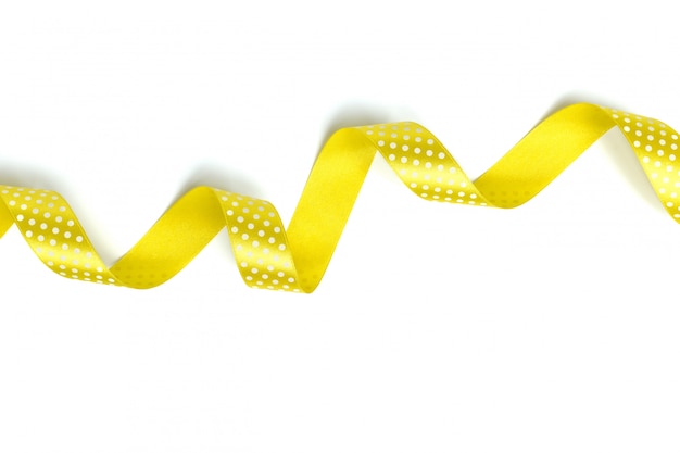 Yellow ribbons isolated on white