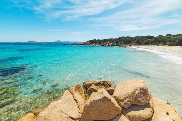 Yellow rocks in Capriccioli beach Sardinia