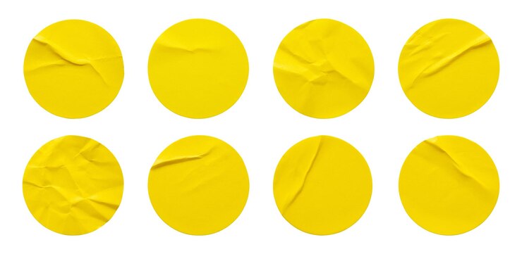 Photo yellow round paper sticker label set isolated on white background