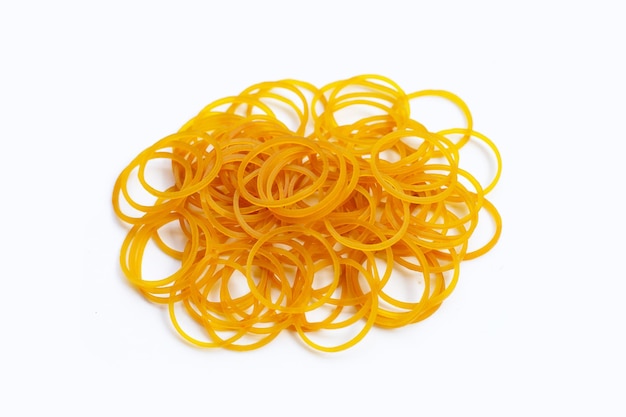 Yellow rubber band on white background