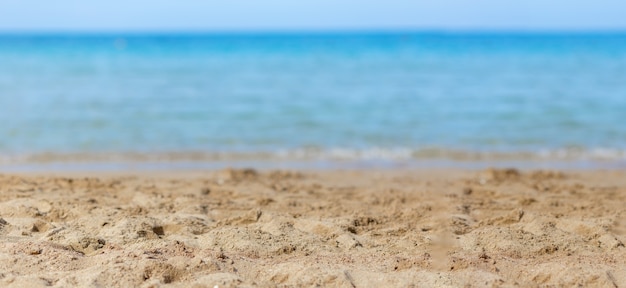 Yellow sand background and decoration of sea sky and sun