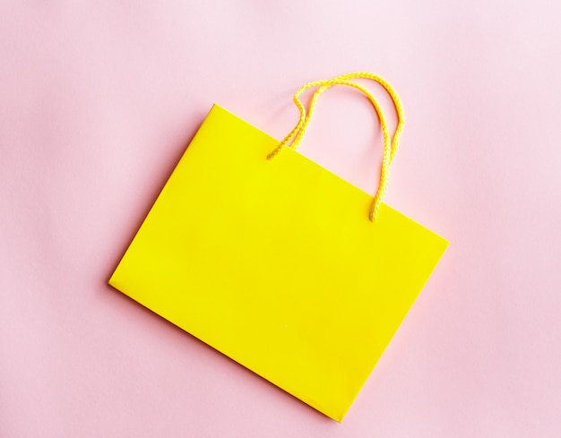 Yellow shopping bag isolated