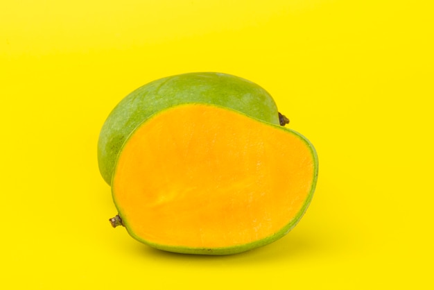 Yellow slice mango isolated on yellow