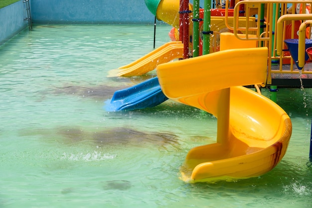 Yellow slider childhood of amusement waterpark
