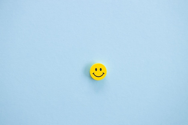 Yellow smile on blue background