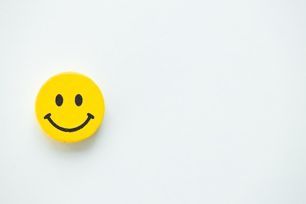 Yellow smile on white background