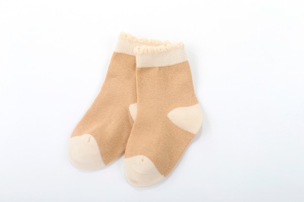 Yellow sock close-up on isolated white background