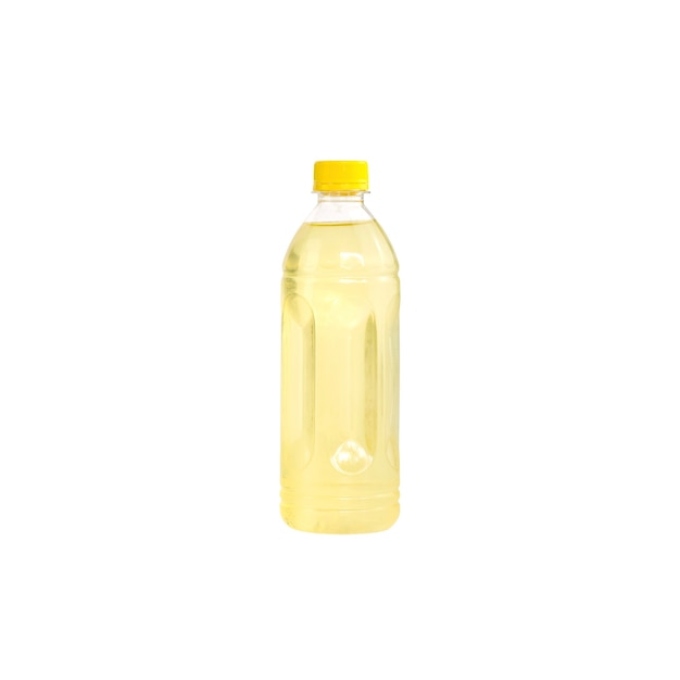 Yellow sparkling water in a plastic bottle isolated
