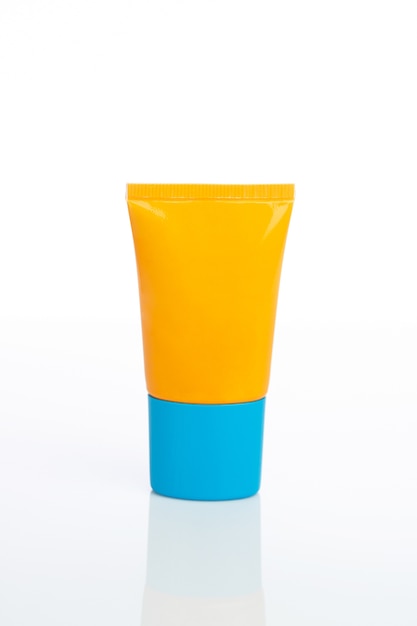 Yellow squeeze tube for contain cream product isolated