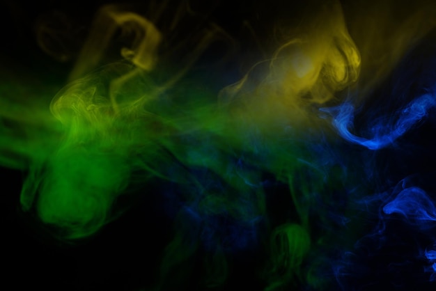 Yellow steam on a black background