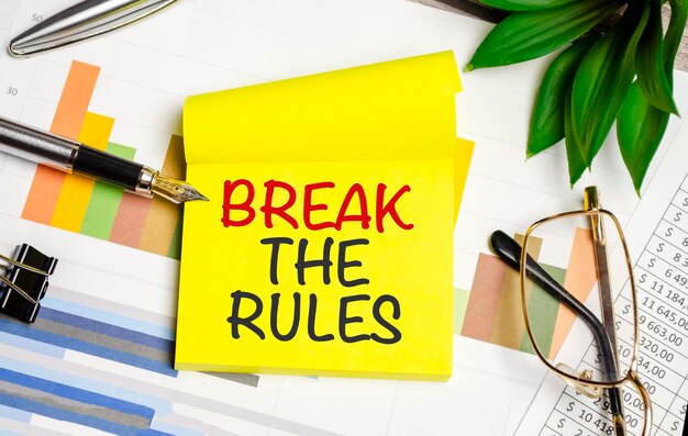 yellow sticker with the text break the rules and charts