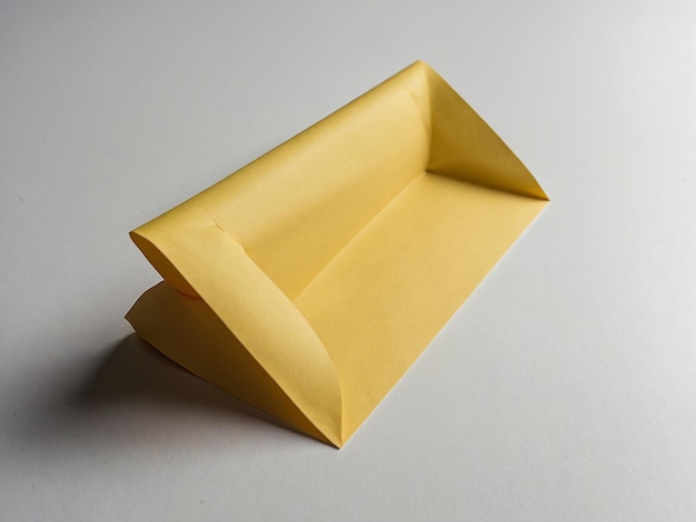 A yellow sticky note placed on a white background