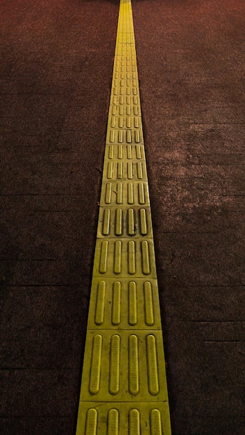 Yellow stripes on road for blind people