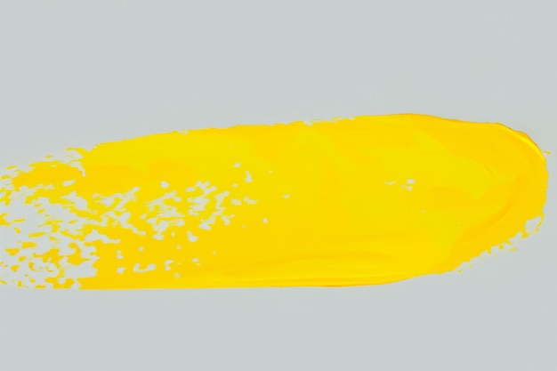 Photo yellow stroke of paint isolated on transparent