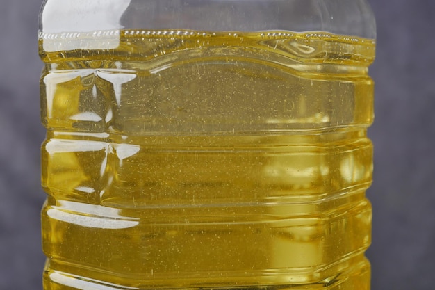 Yellow sunflower oil bottle on table