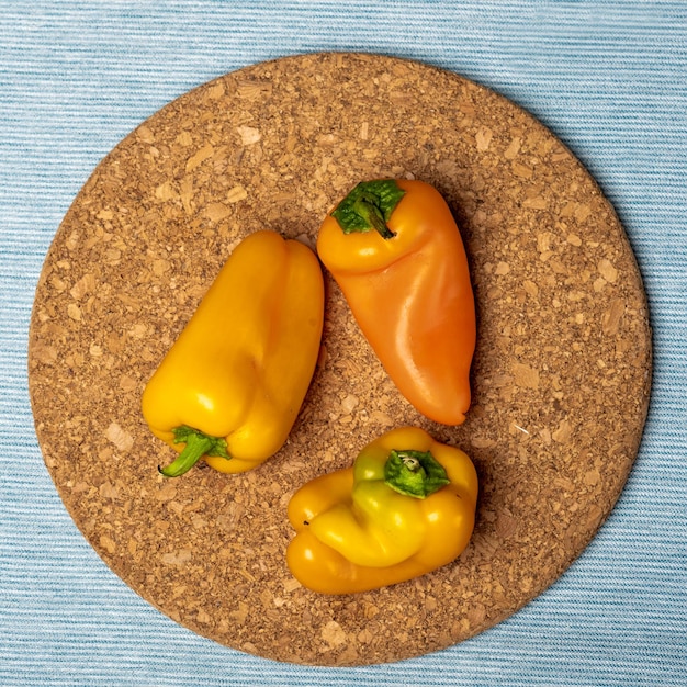 Yellow sweet pepper on a blue background