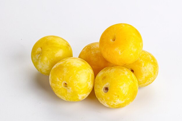 Yellow sweet ripe plum heap fruit