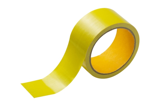 Photo yellow tape roll isolated on white background