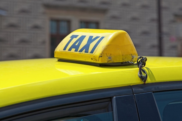 Yellow taxi sign from Prague in Czech Republic