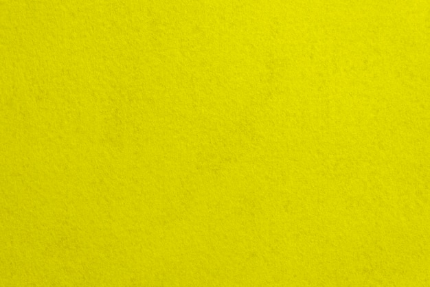 노란색 질감 스웨이드 또는 벨루어 천 근접 디자인을 위한 배경으로 자연 또는 인공 재봉 재료 패브릭