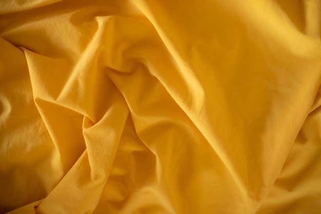 Yellow textured bedding under sunlight