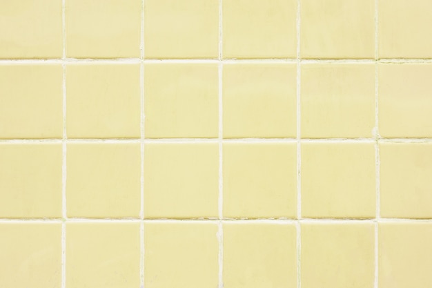 Yellow tile wall pattern background