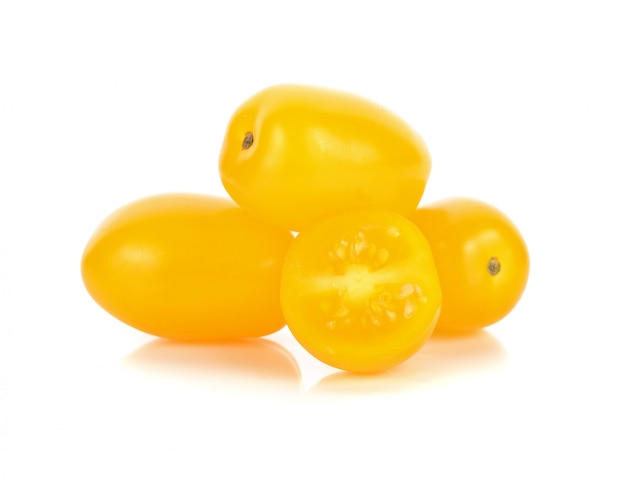 Yellow tomatoes on white background