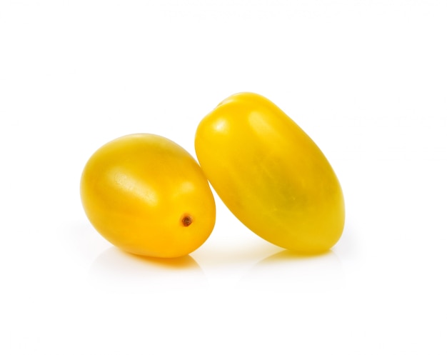 Yellow tomatoes on white space