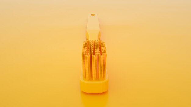 Yellow toothbrush isolated on yellow background