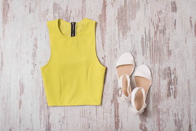 Yellow top and white shoes