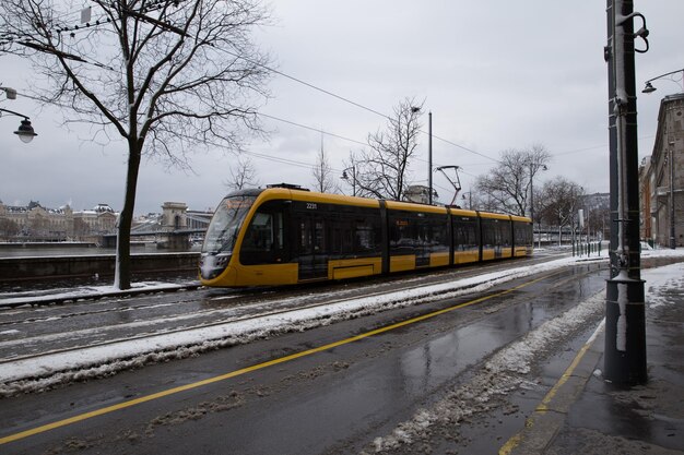 Yellow Train Of Budapest Public Transport Running Through The City