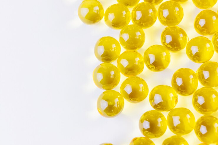 Yellow vitamin dragee